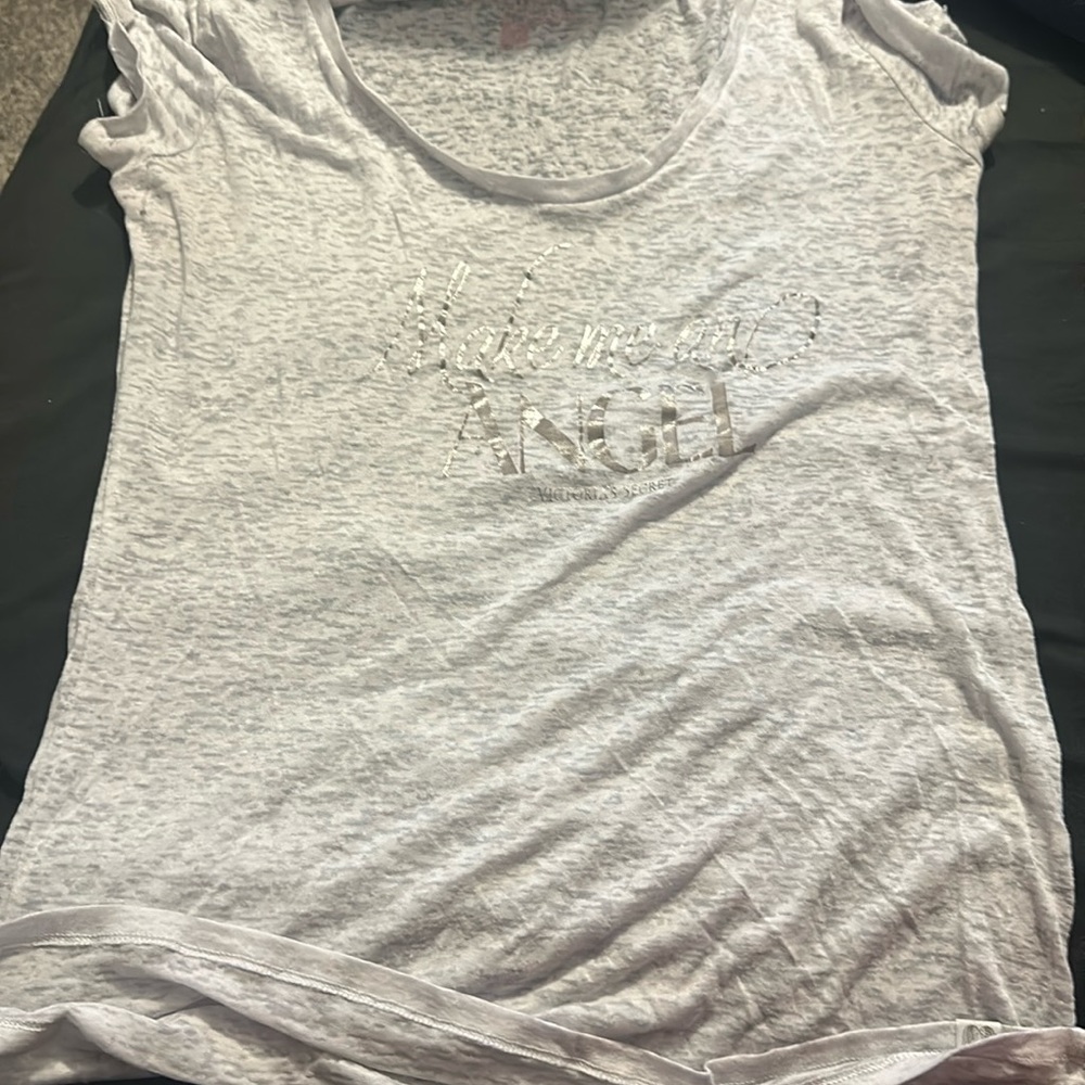 Victoria secret shirt thin material size large has a small hole see picture